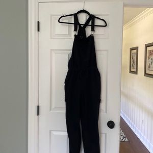 Almost Famous black overalls. Used size Medium.